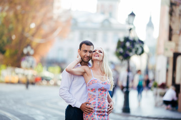 Fototapeta premium Romantic tourist couple walking around the city relaxing