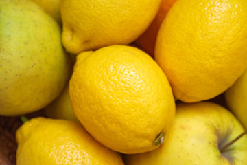 Lemon pattern, lemon texture, lemon color. Yellow lemons.