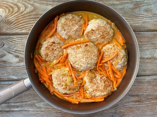 Step by step recipe for meatballs with carrots, cream, soy sauce. Cooking in the photo.
