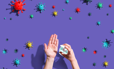 Coronavirus concept with person washing their hands with sanitizer