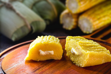 Brazilian sweet corn, called pamonha. Macro photography, close. Corn cream with rural cheese.