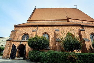 The entrance to the historic, Gothic, Catholic church in Poznan.