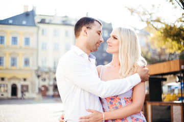 Fototapeta premium woman with her husband walking around the city, dressed neatly
