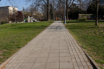 BELGRADE, SERBIA - APRIL 04, 2020: Empty children playground.  Banned for use due to Coronavirus in Serbia. Prevetnion of spreading COVID19