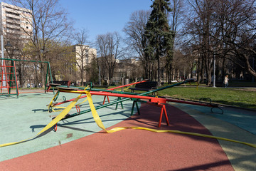 BELGRADE, SERBIA - APRIL 04, 2020: Empty children playground.  Banned for use due to Coronavirus in Serbia. Prevetnion of spreading COVID19