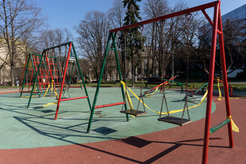BELGRADE, SERBIA - APRIL 04, 2020: Empty children playground.  Banned for use due to Coronavirus in Serbia. Prevetnion of spreading COVID19