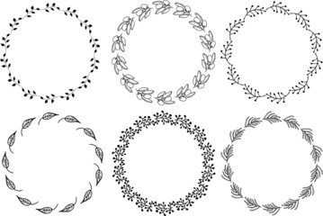 Hand drawn round frames and wreaths isolated on white background. Hand sketched design elements. Unique and ready to use.