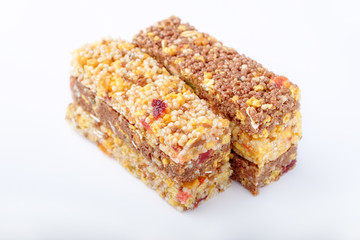 brown granola bars on white background
