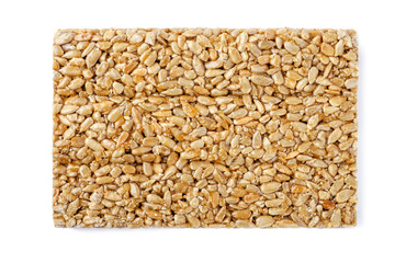 Sunflower seeds in caramel Isolated on white background