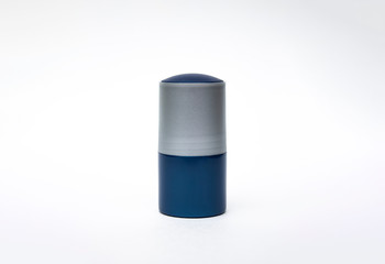 Blue compact roll on deodorant isolated on white