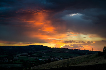 Sunset over the city hills of Bologna, Italy, after a strorm