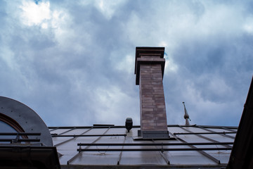 chimney on the roof with blue sky