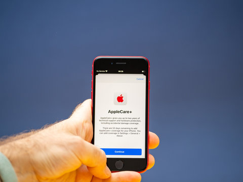 Paris, France - Apr 26, 2020: AppleCare Plus on new budget iPhone SE by Apple Computers touch ID, Single-lens rear camera and iPhone 8 design with internals from 11 Pro version
