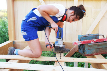 A Woman Carpenter, working on site