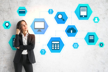 Pensive businesswoman and drawing cloud computing diagram