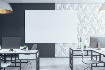 Contemporary office interior with daylight and empty white poster.