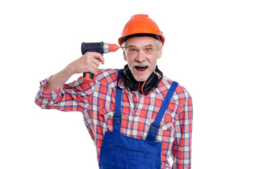 Photo of senior male, professional worker in blue uniform with electric drill near head, isolated on white background