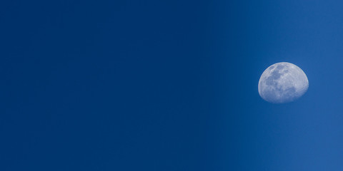 Simple Full moon in the blue sky