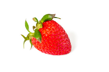 Ripe red strawberries with green leaves, on white