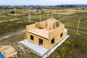 Construction of new and modern modular house. Walls made from composite wooden sip panels with...