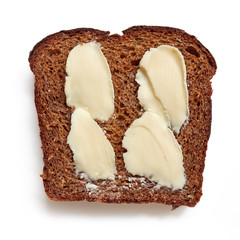 slice of rye bread with butter