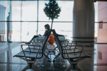Empty gate at the airport, a lot of free seats