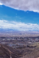 Salt Lake Valley and City panoramic views from the Red Butte Trail to the Living Room, Wasatch Front, Rocky Mountains in Utah early spring. Hiking view of trails around the University and Gardens and 