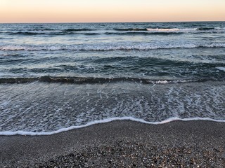sea ​​with sand at sunset