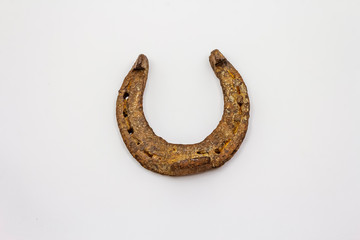Cast iron metal horse horseshoe isolated on white background