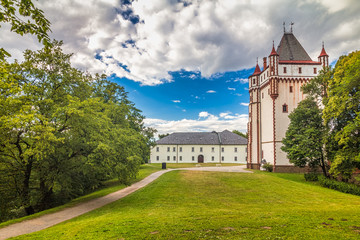 Fototapeta na wymiar White castle and white tower in Hradec nad Moravici town, Czech Republic, Europe.