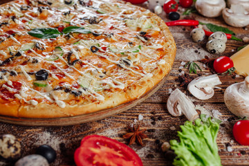 pizza on a wooden background