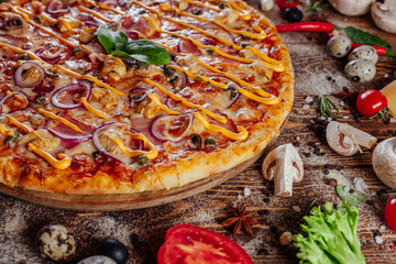 pizza on a wooden background