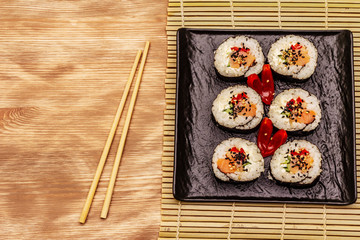 Korean roll Gimbap(kimbob). Steamed white rice (bap) and various other ingredients