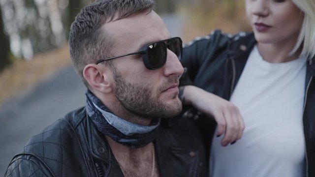Portrait of hipster's couple in love looking on each other in park