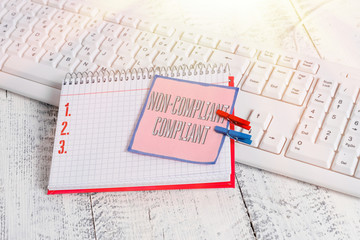 Word writing text Non Compliant Compliant. Business photo showcasing Resistant to the Rule in...