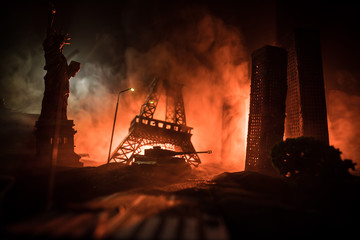 Empty street of burnt up city, flames on the ground and blasts with smoke in the distance....