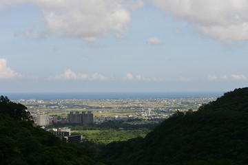Sunny high angle view of the Yilan plain landscape from Catholic Sanctuary of Our Lady of Wufengqi
