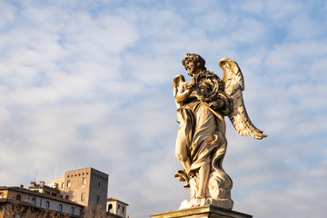 Fototapeta na wymiar Ponte Sant'angelo. Pedestrian bridge over the Tiber, bridge of the Holy angel. Figure on the bridge close-up.
