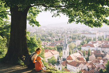 Family look at panorama of Ljubljana, Slovenia, Europe. - obrazy, fototapety, plakaty