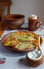 Potato pancakes with sour cream. Ukrainian dinner