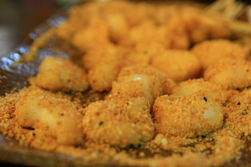 Close up shot of delicious Mochi with peanut powder