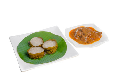 Lemang  and Rendang isolated on white background. Popular food for breaking fast during ramadan, Ramadan Food.