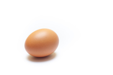 brown chicken egg isolated on white background