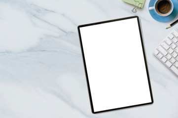 Mockup tablet with blank screen on white marble table.
