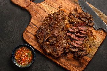 Thai-style grilled beef with Thai spicy sauce. The hot dipping sauce is supposed to bring tears to...
