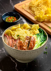 Egg Noodles Wonton Soup with Red Roast Pork and Roast Duck. Made with thin fresh or dried wheat and egg noodles and a chicken and pork broth simply seasoned with a bit of salt, sugar, soy sauce,