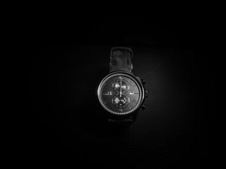 Black and white photo of luxury clock for men