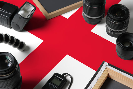 Georgia national flag with top view of personal photographer equipment and tools on white wooden table, copy space. - Powered by Adobe