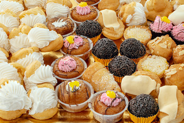 tray of assorted cupcakes