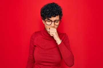 Obraz na płótnie Canvas Young beautiful african american afro woman wearing turtleneck sweater and glasses feeling unwell and coughing as symptom for cold or bronchitis. Health care concept.